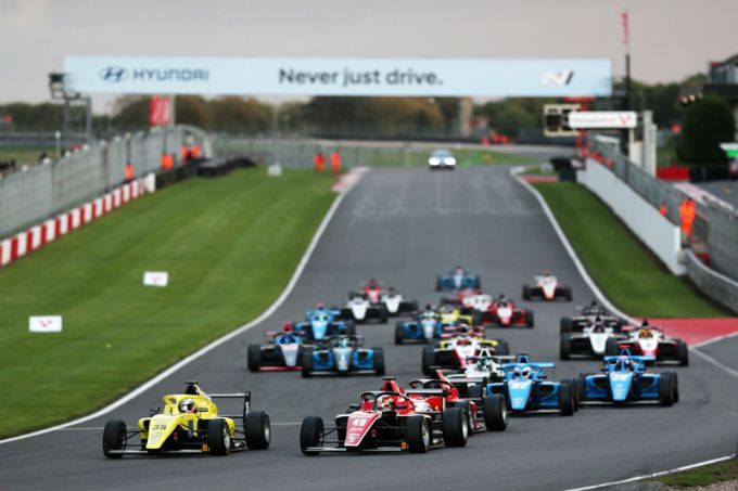 The two title contenders went wheel to wheel at turn one